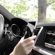 Univerzális szellőzőrácsba illeszthető PDA/GSM autós tartó 3,5-6" méretű készülékekhez - HOCO CA38 Air Outlet In-Car Holder - fekete
